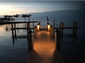 Dock At Sundown. Night Fishing Or Watch Star Sky