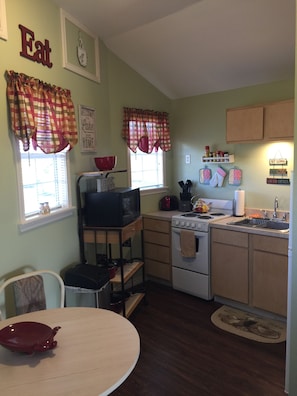 Small but complete, you’ll enjoy being able to prepare meals in this kitchen!