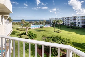 Patio - Ocean view patio features a table with seating for four and an electric grill for outdoor barbequing. Perfect spot to relax and unwind!