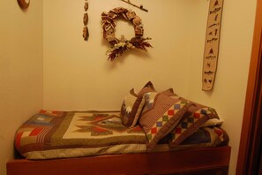 Alcove  bed is 71 inches long by 28 inches wide
