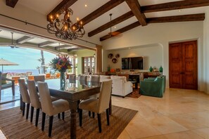 Living room and Dining room with access to covered terrace