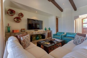 Comfy living area with satellite TV and ocean views from your couch