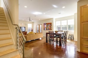 Dining area seats 8.  Both kitchen and dining areas open to the living room.