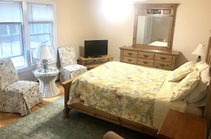 Larger bedroom- queen with lots of space.  Door to outdoor shower.