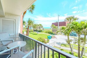 Private balcony with seating, offering a peaceful outdoor retreat