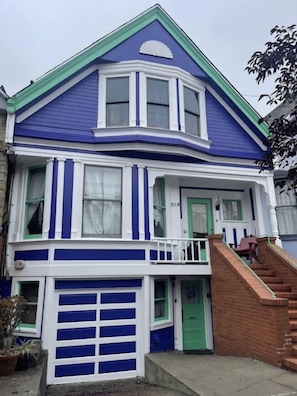 Our beautiful Edwardian turn-of-the-century home! Your entrance is the main entrance up the brick stairs.  (We have a separate in-law unit, whose entrance is through the garage.)