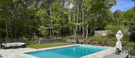 Beautiful yard with an amazing salt water pool.