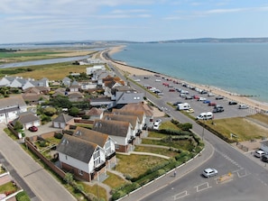 The house is 2nd from the left. This photo shows the coast towards Hurst Spit