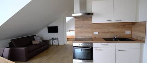 Appartement für 3-4 Personen mit Balkon-Wohnbereich mit Küche