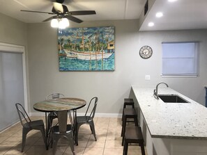 Dining area adjoins the kitchen and is open to the living room