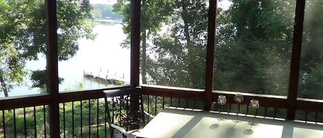 Screened in porch overlooking lake