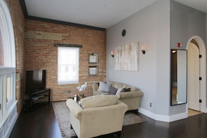 Living Room with Large Flat Screen HD/TV and WiFi