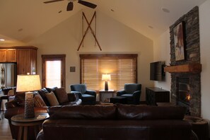 Great room view. Back door to large deck with table & chairs; view of Tetons!