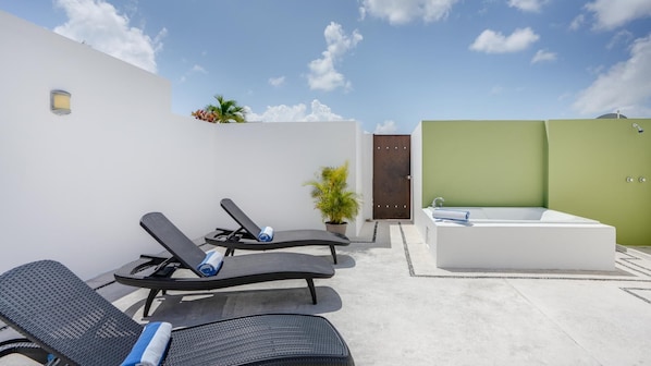Relax in the private jacuzzi after a long day.