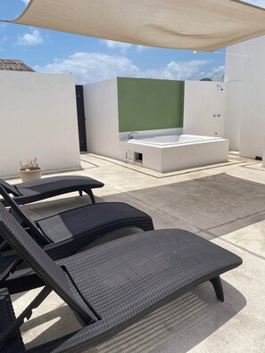 Relax in the private jacuzzi after a long day.