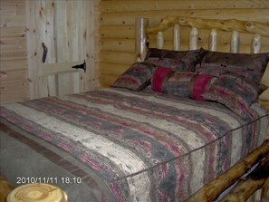 Two Private Bedrooms with Log Furniture and All Wood Interior.