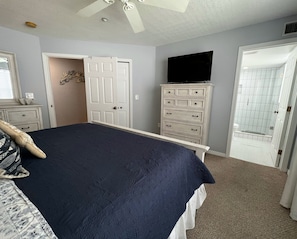 Master bedroom and private attached bathroom. - Master bedroom and private attached bathroom.