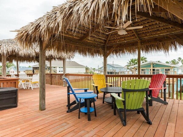 Shaded breezy palapas on deck overlooking the canal