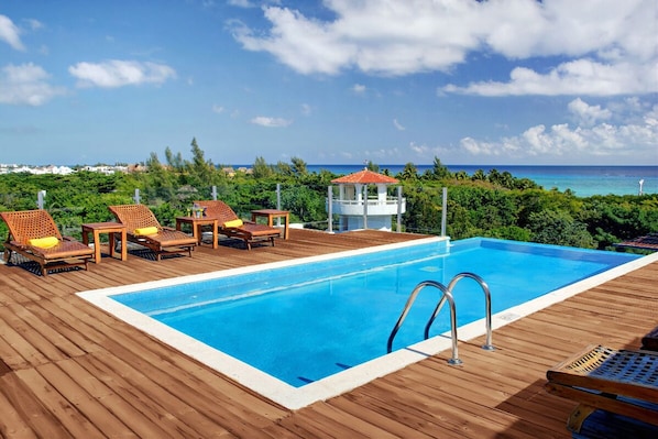 Relax by the pool on sunny days.