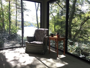 View of lake from living room couch