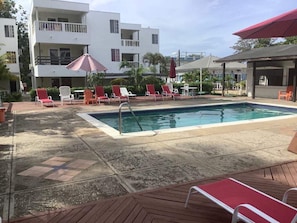 Community Pool, new patio furniture, private jacuzzi area, beach bar and grill. 