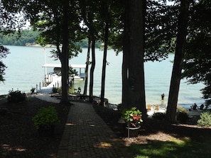 Looking toward lake, fire pit and beach area from house.