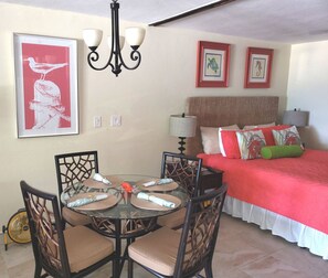 View of the dining area and bedroom which may be partitioned off.