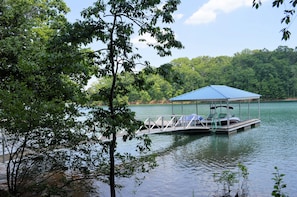 Deep water covered dock with large swim deck
