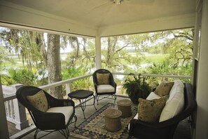 Our very comfortable porch with expansive marsh and water views!