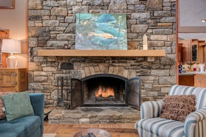 Fireplace in living room was built by a third generation stone mason.