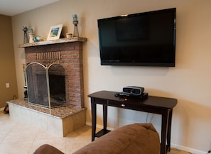 Living Room Roku TV, I-Pod / I-Phone Dock / Radio