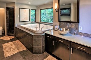 Master bathroom with views from every window