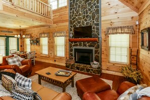 Open living complete with fireplace!