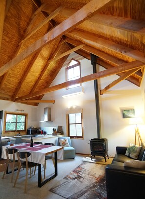 Huge cathedral ceilings give that real mountains cottage vibe.