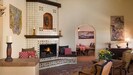 The great room fireplace is a great place for people to gather around