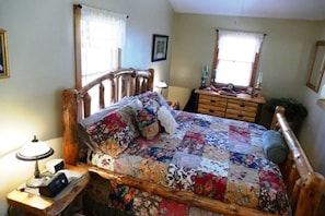Level 3 King Bedroom has luxury bedding and lots of light and private bath.