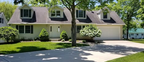 Front of house.  Double concrete driveway.