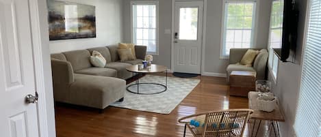 Spacious living room with smart tv