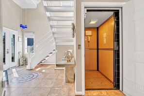 Elevator to carry luggage and groceries and also for elderly and handicapped