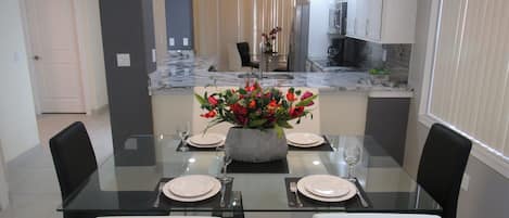 View of kitchen from the dining area. 