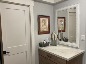 Draw stack outside of bath room, for guest using the room with the murphy bed