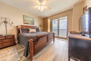 Gulf front master bedroom with a king size bed.