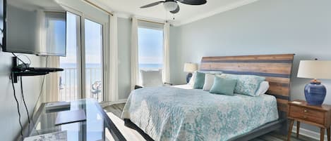 Gulf front master bedroom with a king size bed.