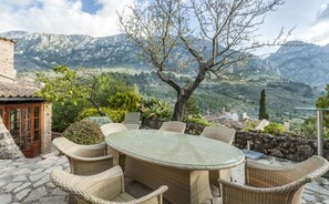 Outside dining table, seats 6, on bottom terrace