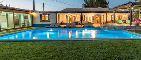 Front view of the house and pool.