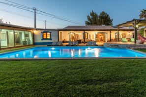 Front view of the house and pool.
