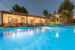 Front view of the house and pool.