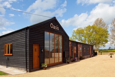 Four luxury barns in one. Dog friendly with games room for up to 12 people.