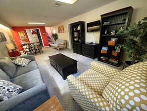 The Nest is a 1000 sf garden level apartment with gobs of light. 