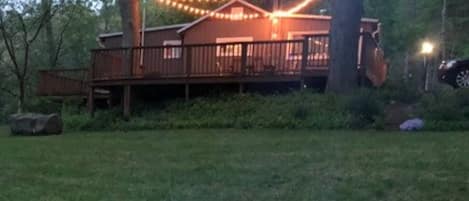 Cabin with evening deck lights